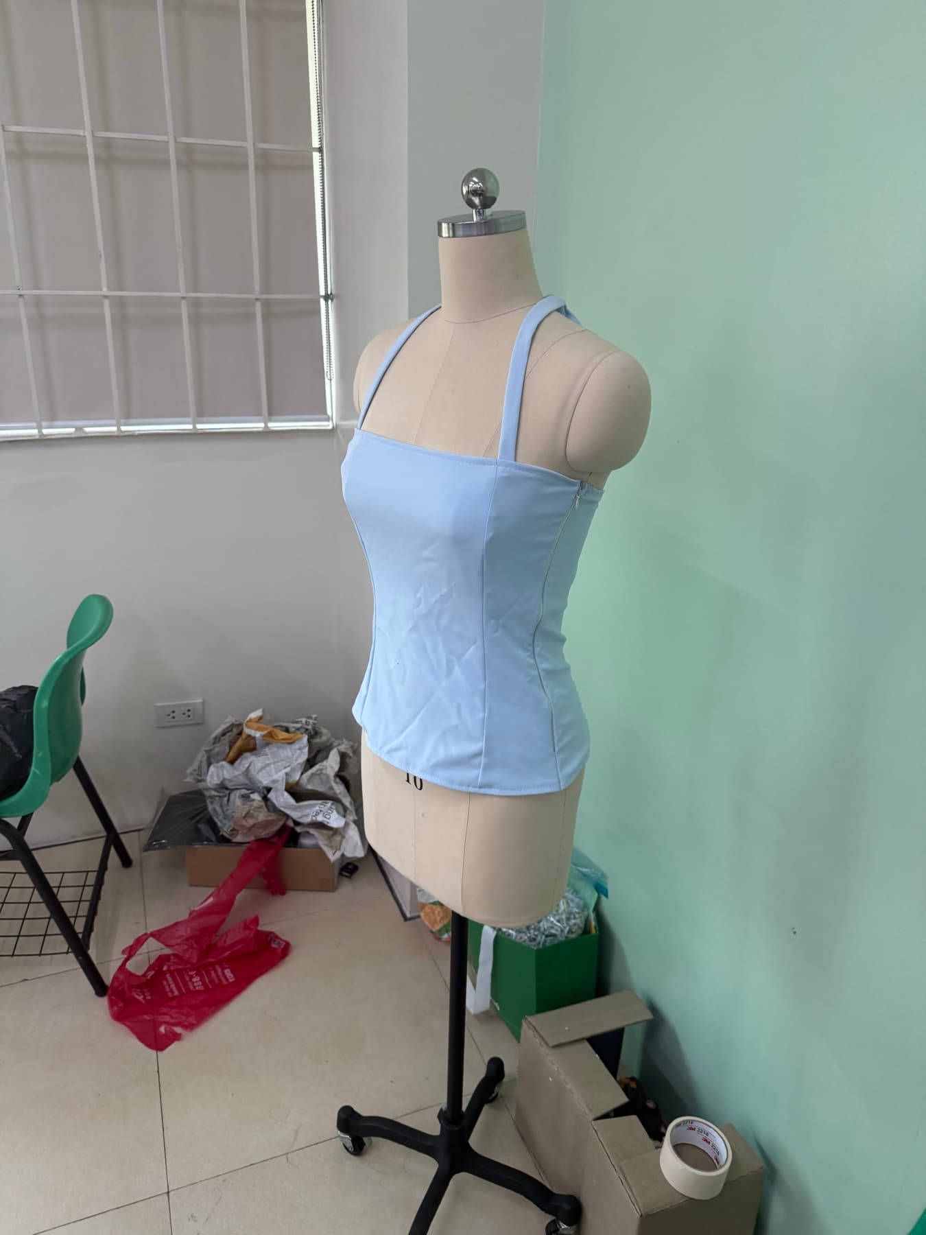 Close-up of the top’s side seam and zipper